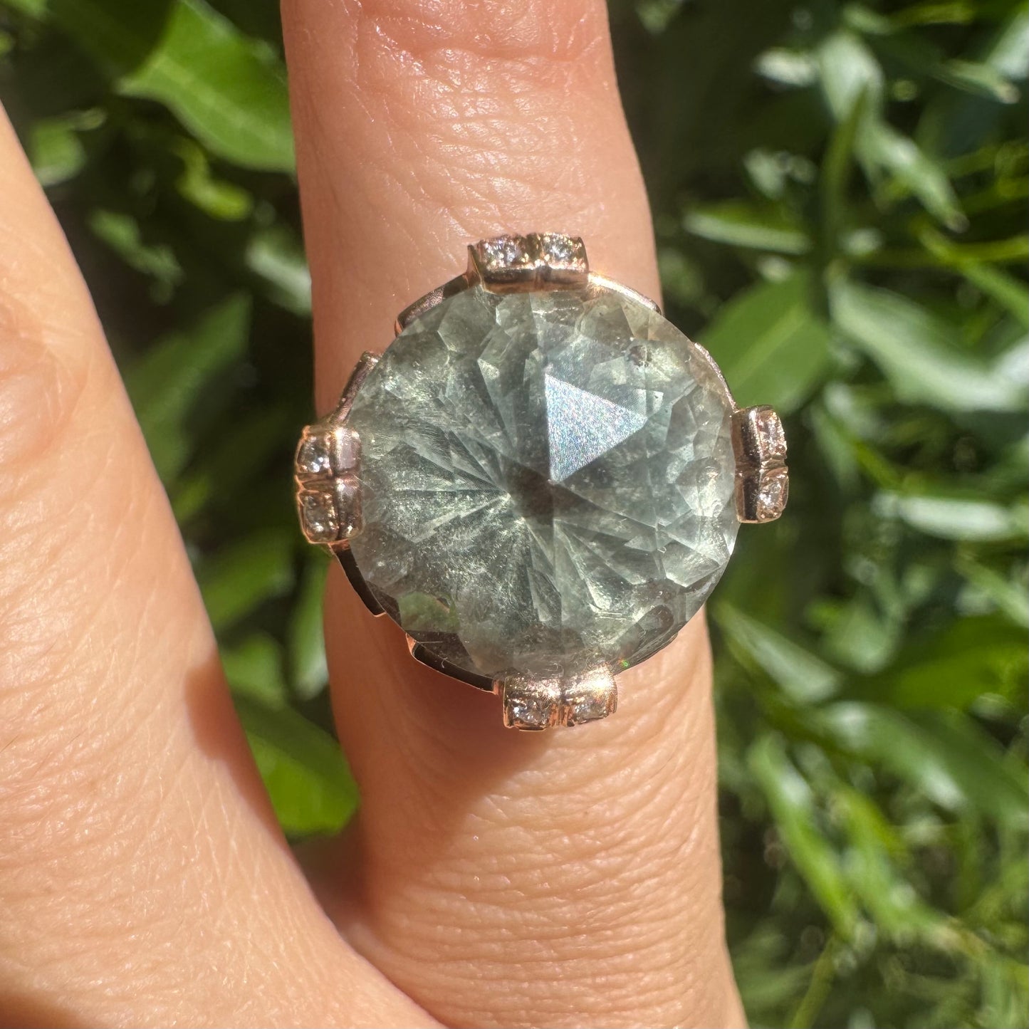 18K gold ring set with a stunning faceted Prasiolite, delicately accented with Diamonds on each prong