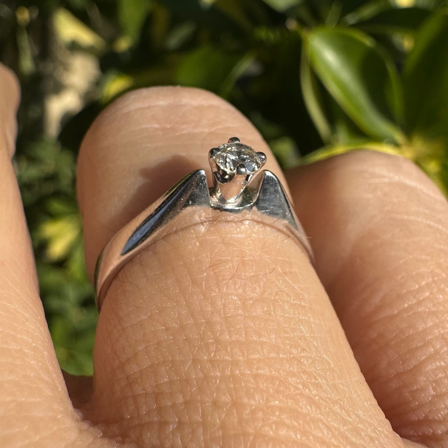 14K gold ring set with one center Diamond