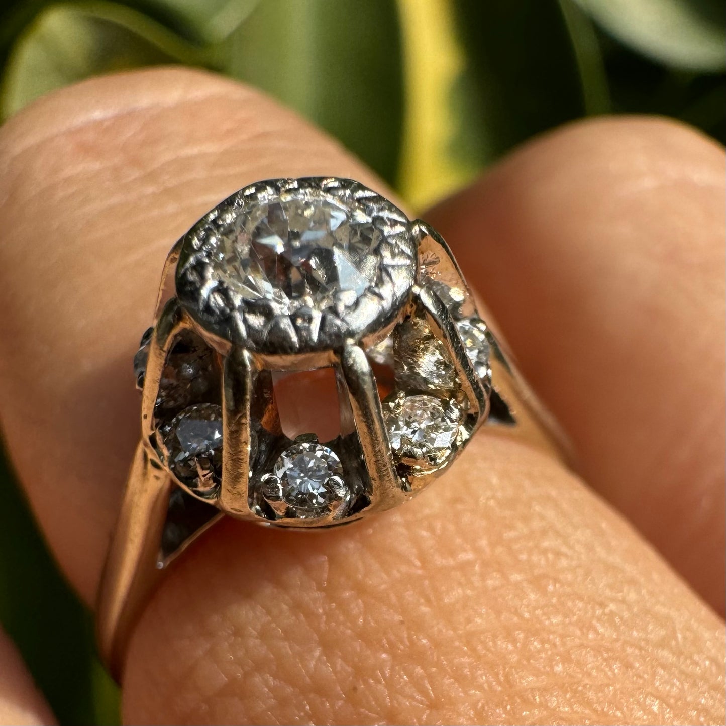 18K gold ring set with Diamonds in     a classic cluster-style