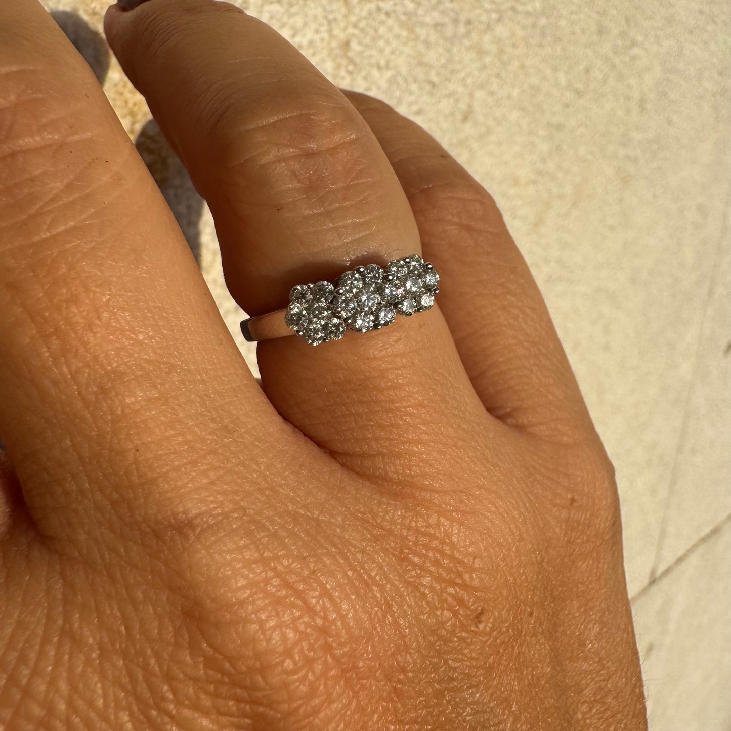 14K white gold ring set with clusters of brilliant white Diamonds