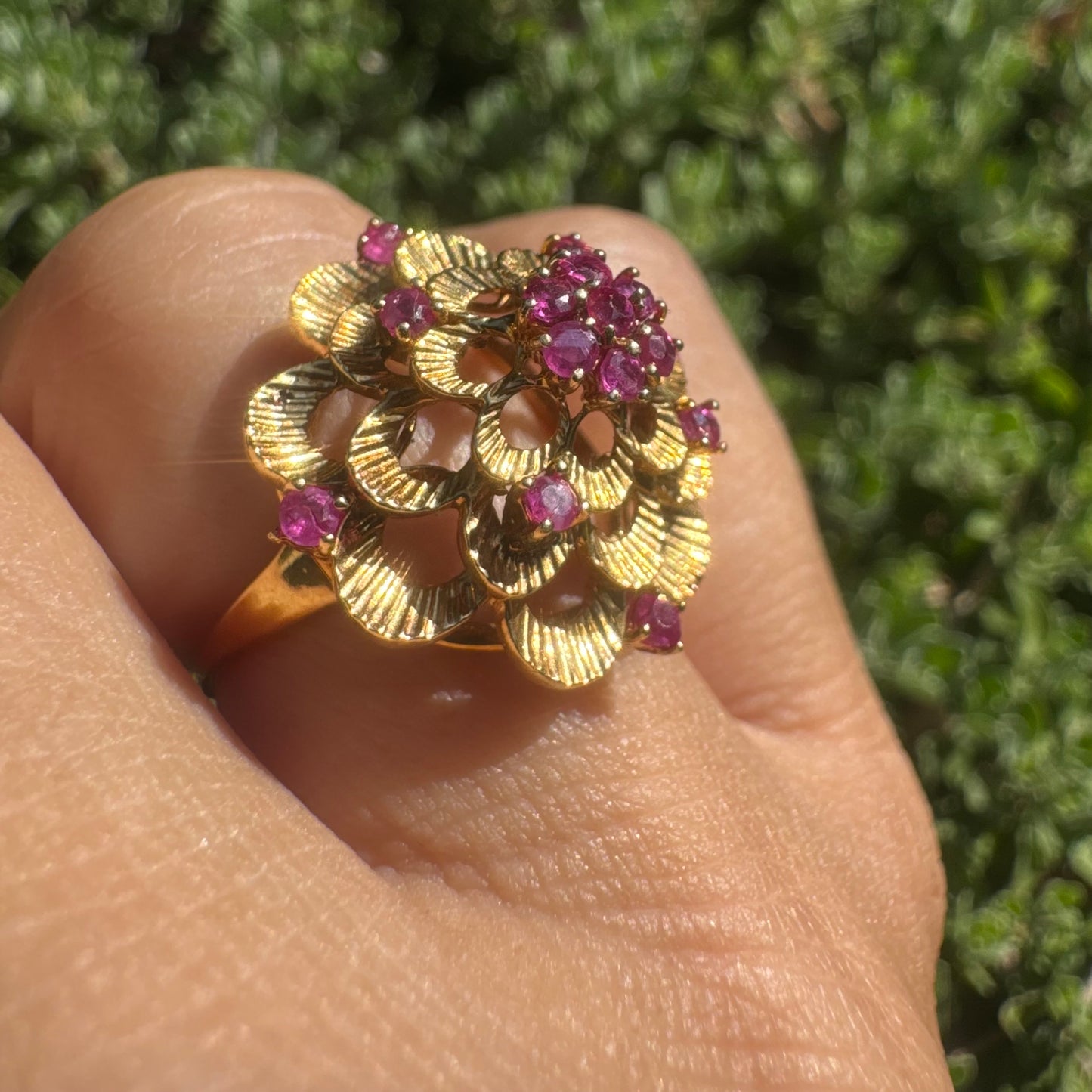 18K gold ring crafted in yellow gold, designed in a layered floral motif set with Rubies