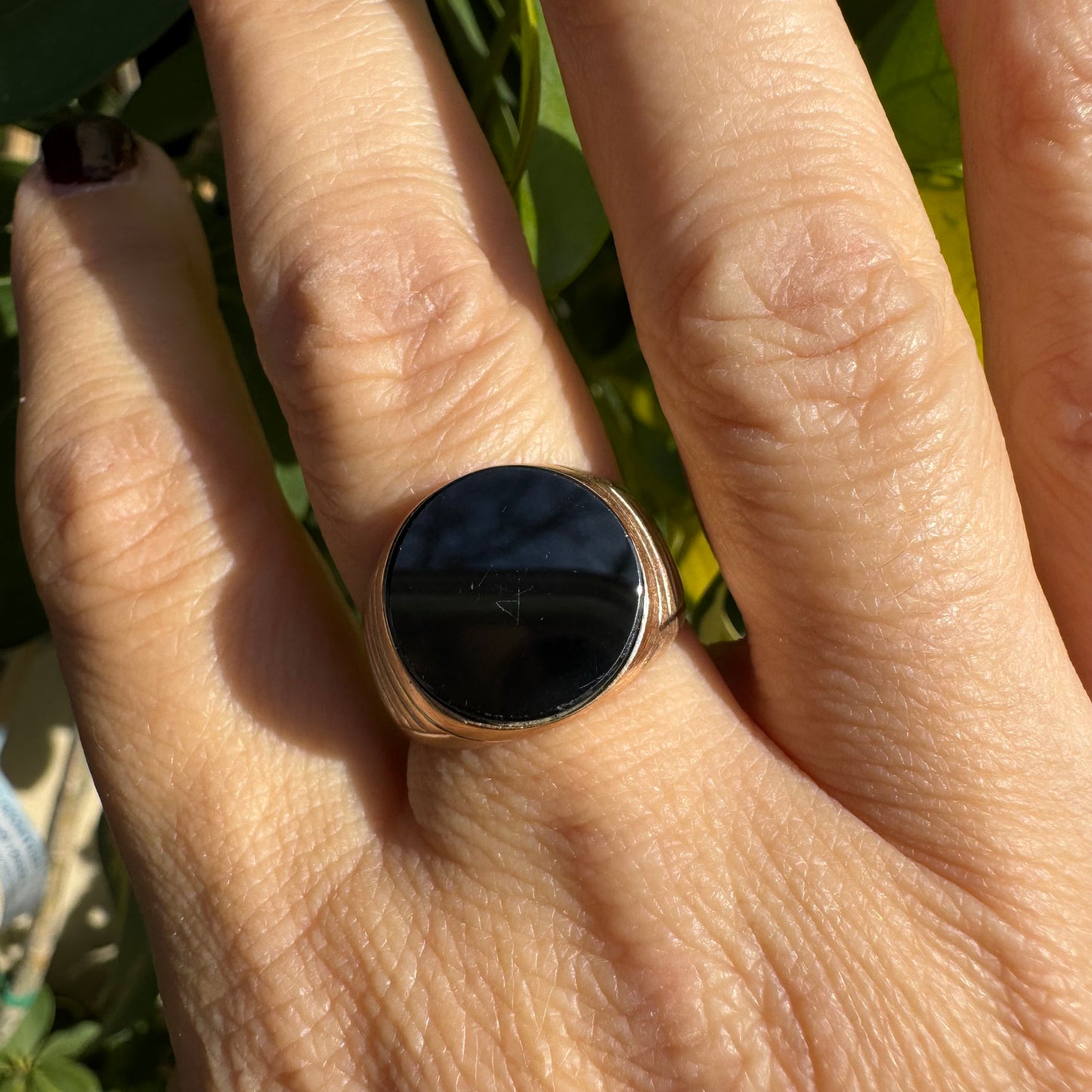 14K gold signet ring crafted in yellow gold, set with a smooth Black Onyx.
