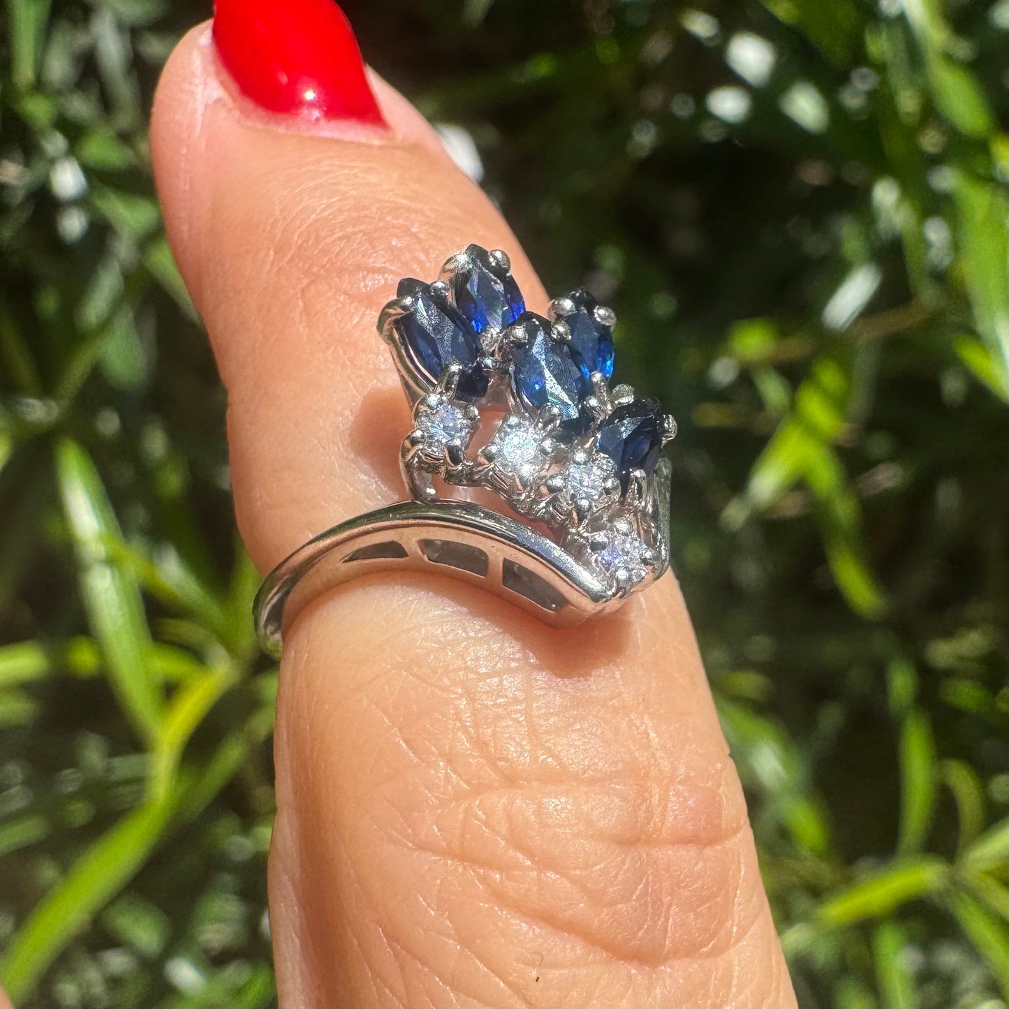 14K gold ring set with marquise-cut deep blue sapphires & Diamonds