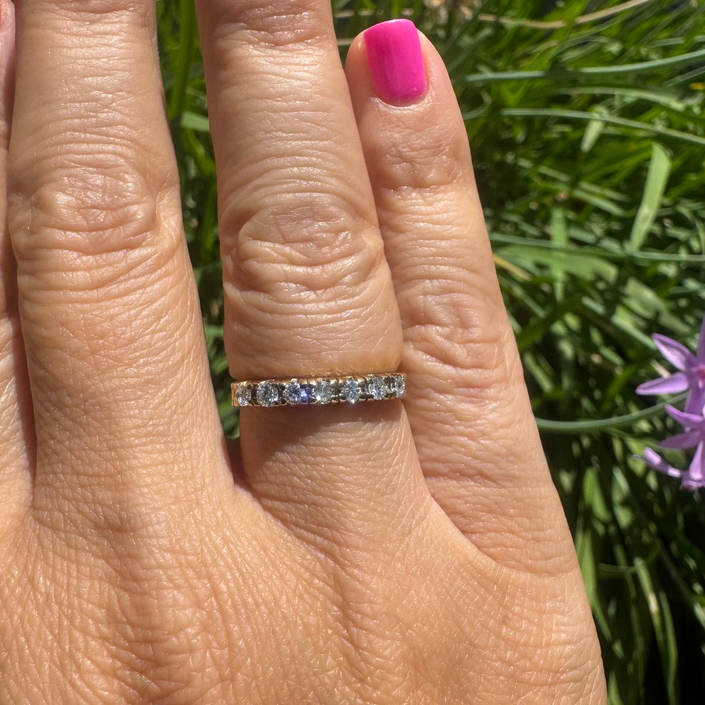 14K gold ring set with 7 Diamonds