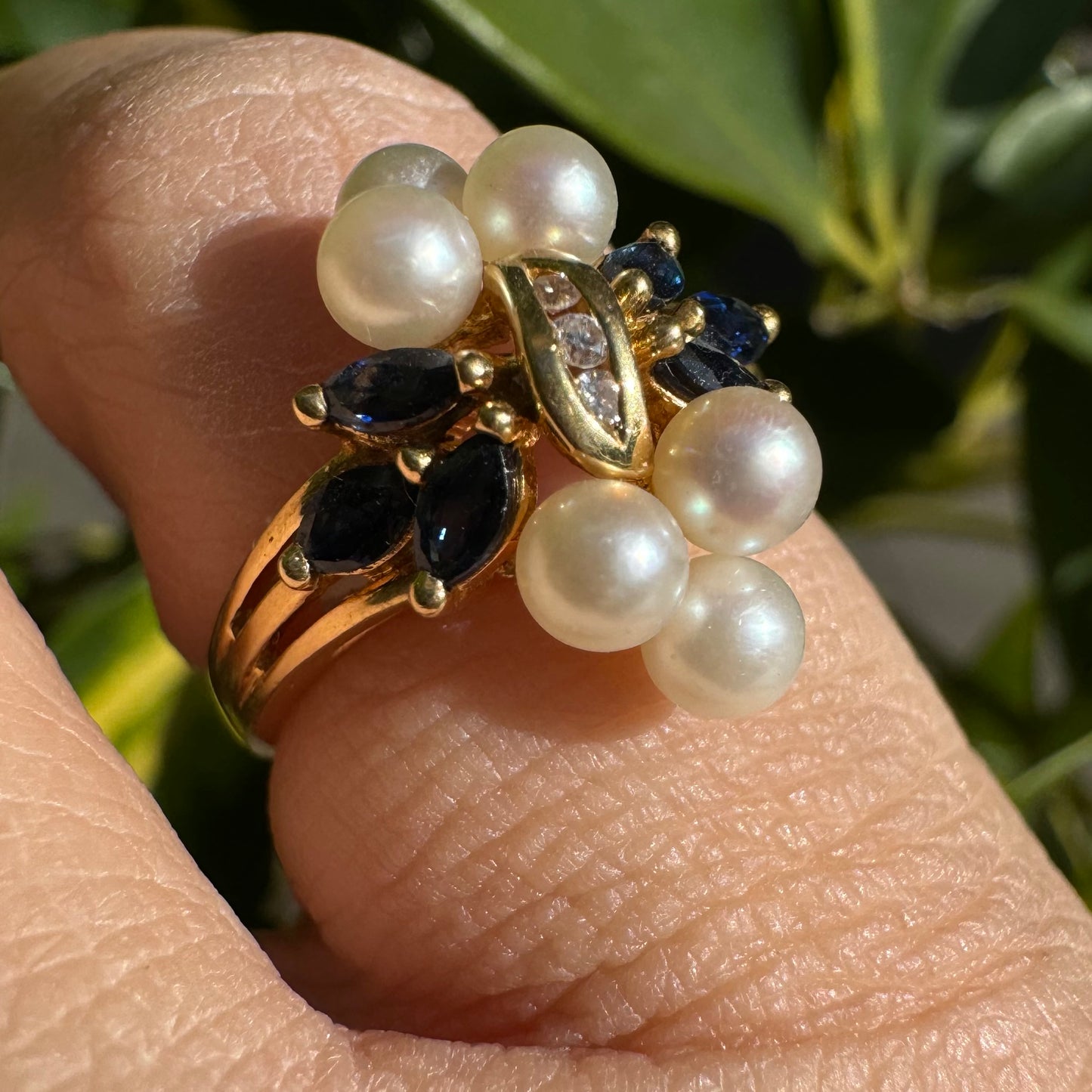 18K gold floral-inspired ring set with Diamonds, Sapphire & Pearls