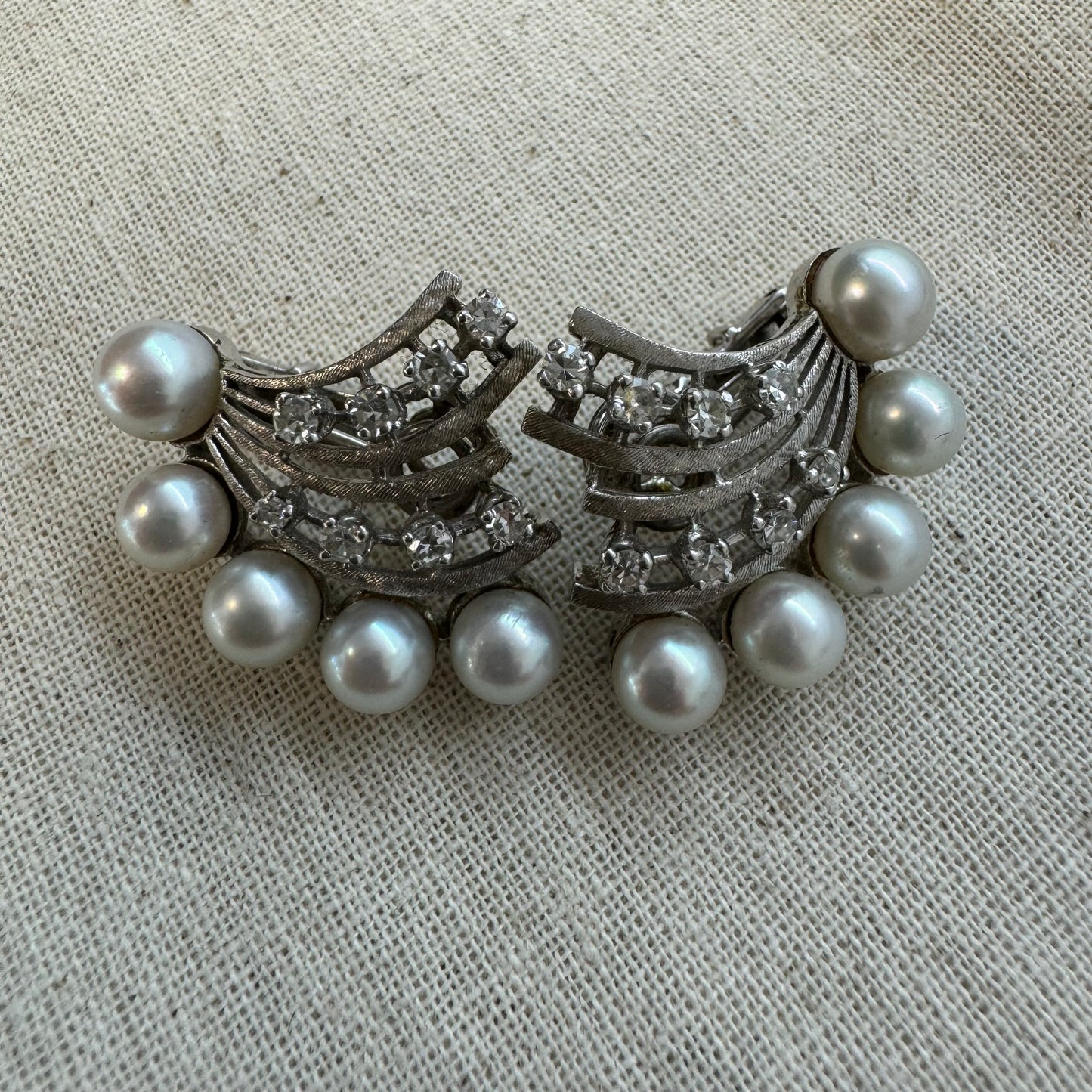 14K gold clip-on earrings set with lustrous pearls & sparkling Diamonds