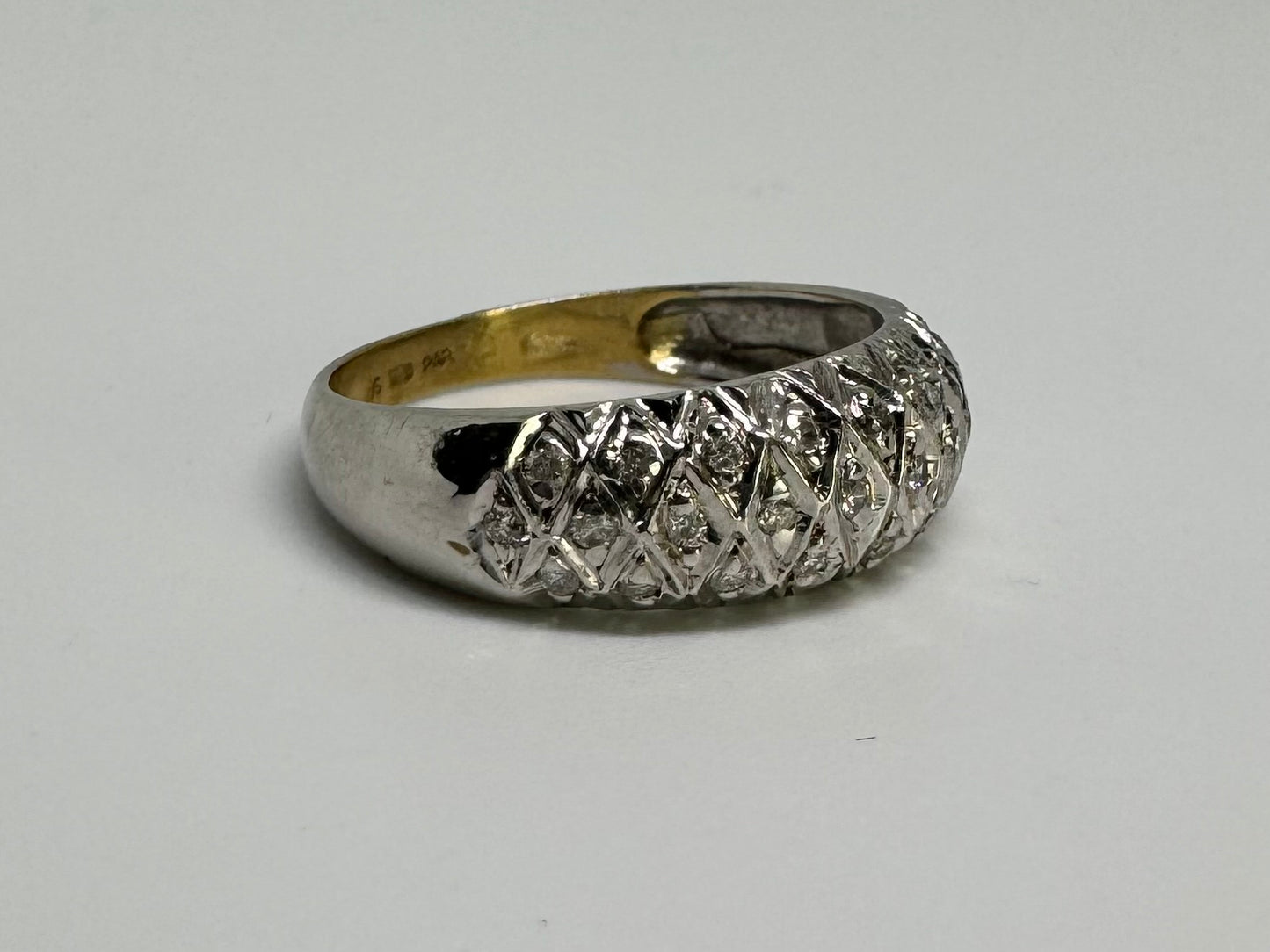14K gold ring set with Diamonds