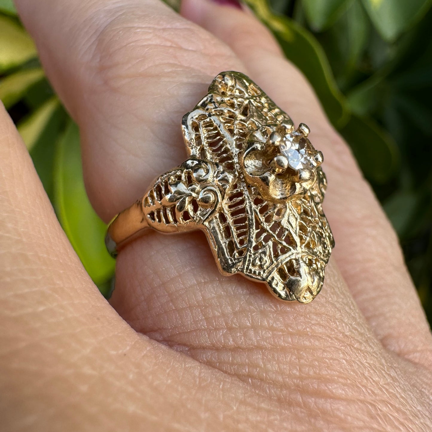 14K gold filigree ring set with an old-cut Diamond