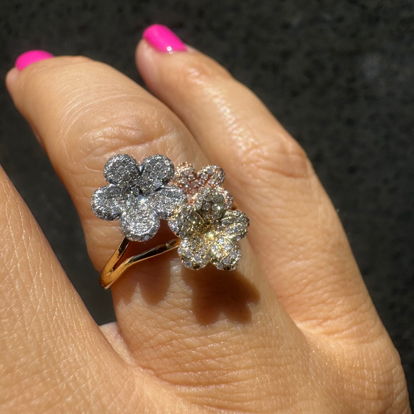 14K gold trio ring featuring white, yellow & rose gold blossoms, each encrusted with sparkling Diamonds.