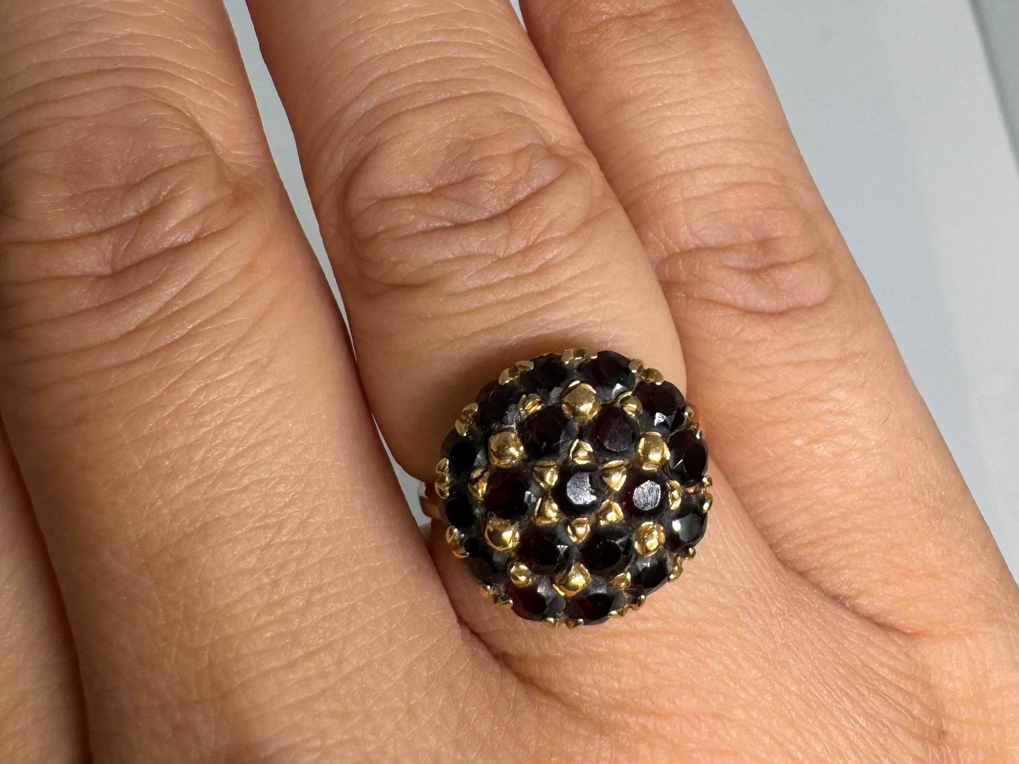 18K gold ring set with Garnets in rich gold prong settings