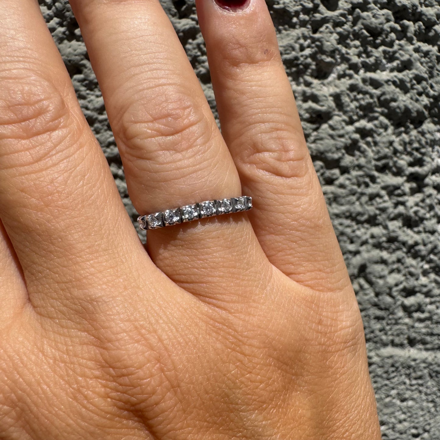 14K gold ring set with a row of sparkling Diamonds