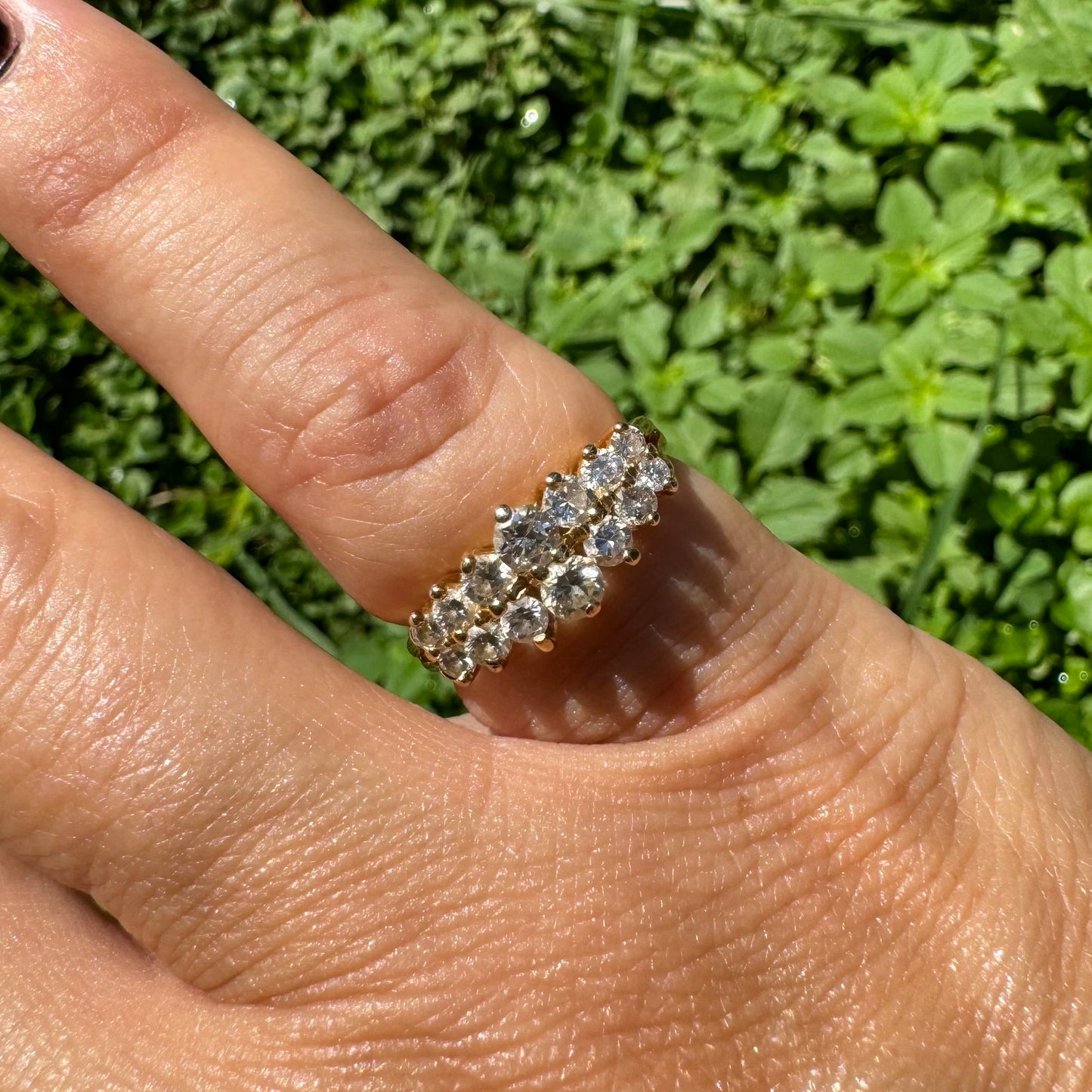 14K gold ring set with two dazzling rows of round-cut Diamonds