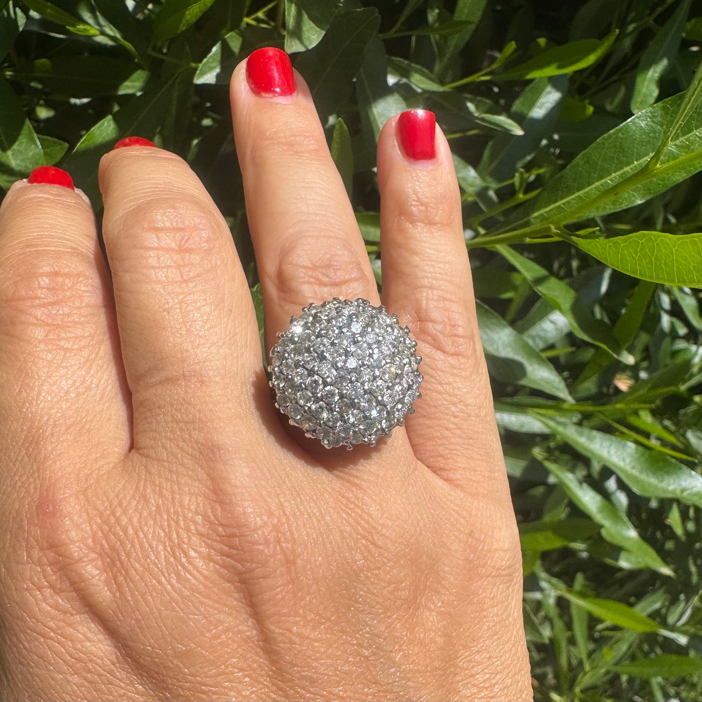 18K gold ring set with Diamonds in a bold pavé setting.