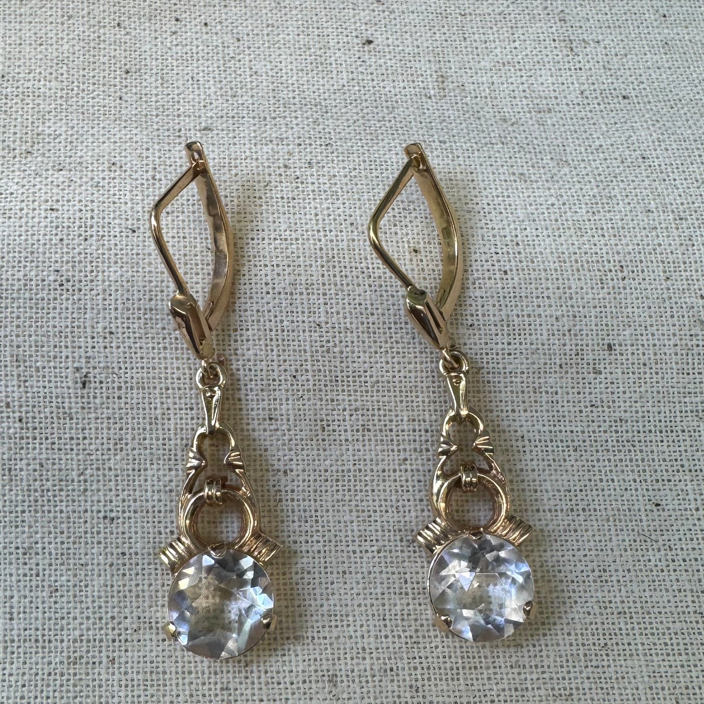 14K gold drop earrings crafted in warm gold, featuring old-cut clear stones