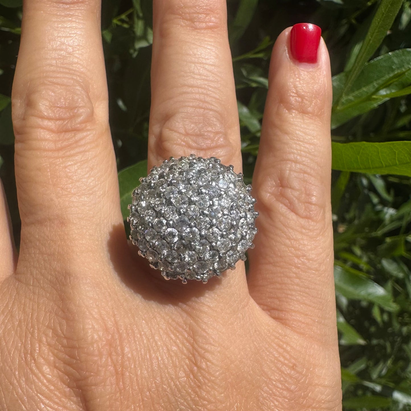 18K gold ring set with Diamonds in a bold pavé setting.