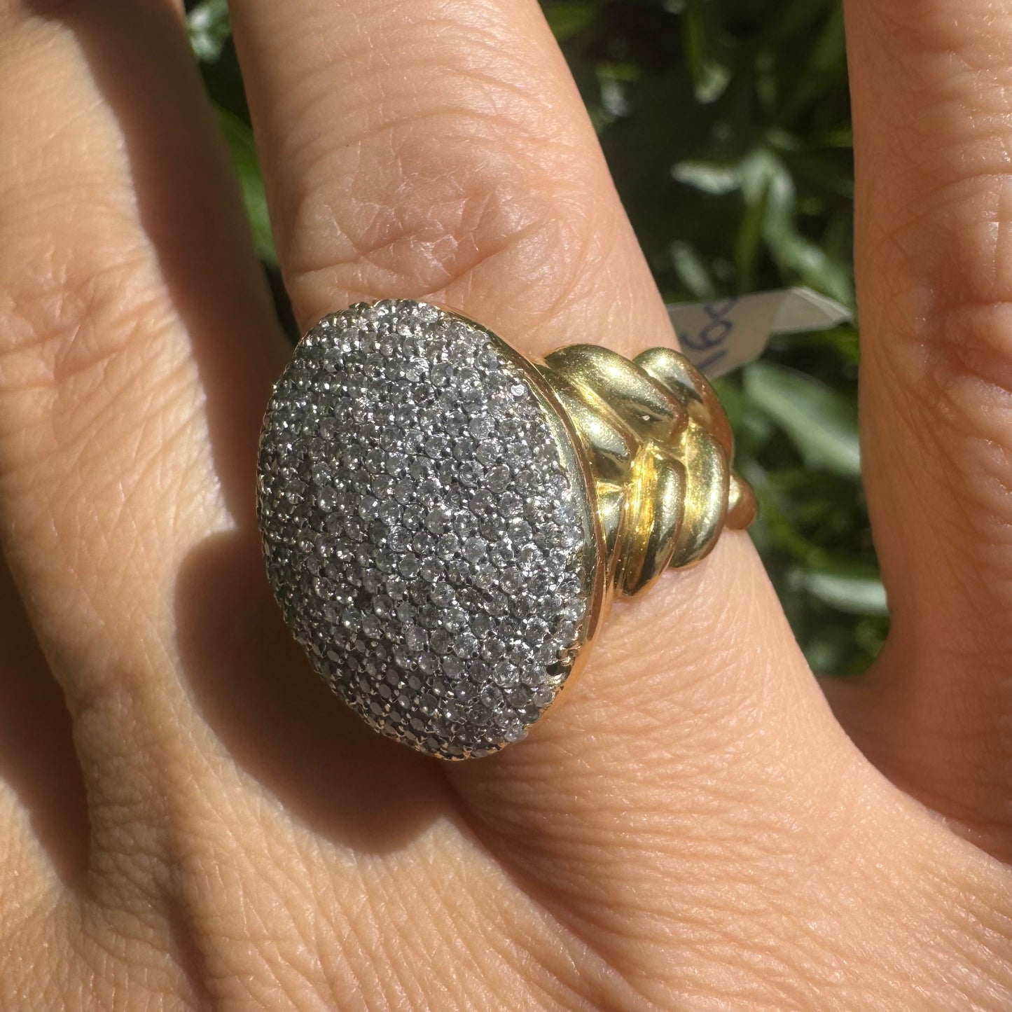 18K gold ring set with a dazzling dome of pavé-set diamonds