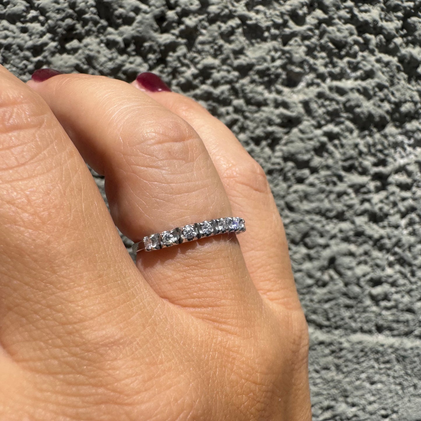 14K gold ring set with a row of sparkling Diamonds