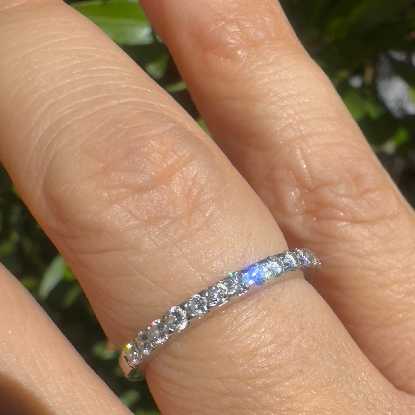 14K gold half-eternity ring set with a row of sparkling round Diamonds.