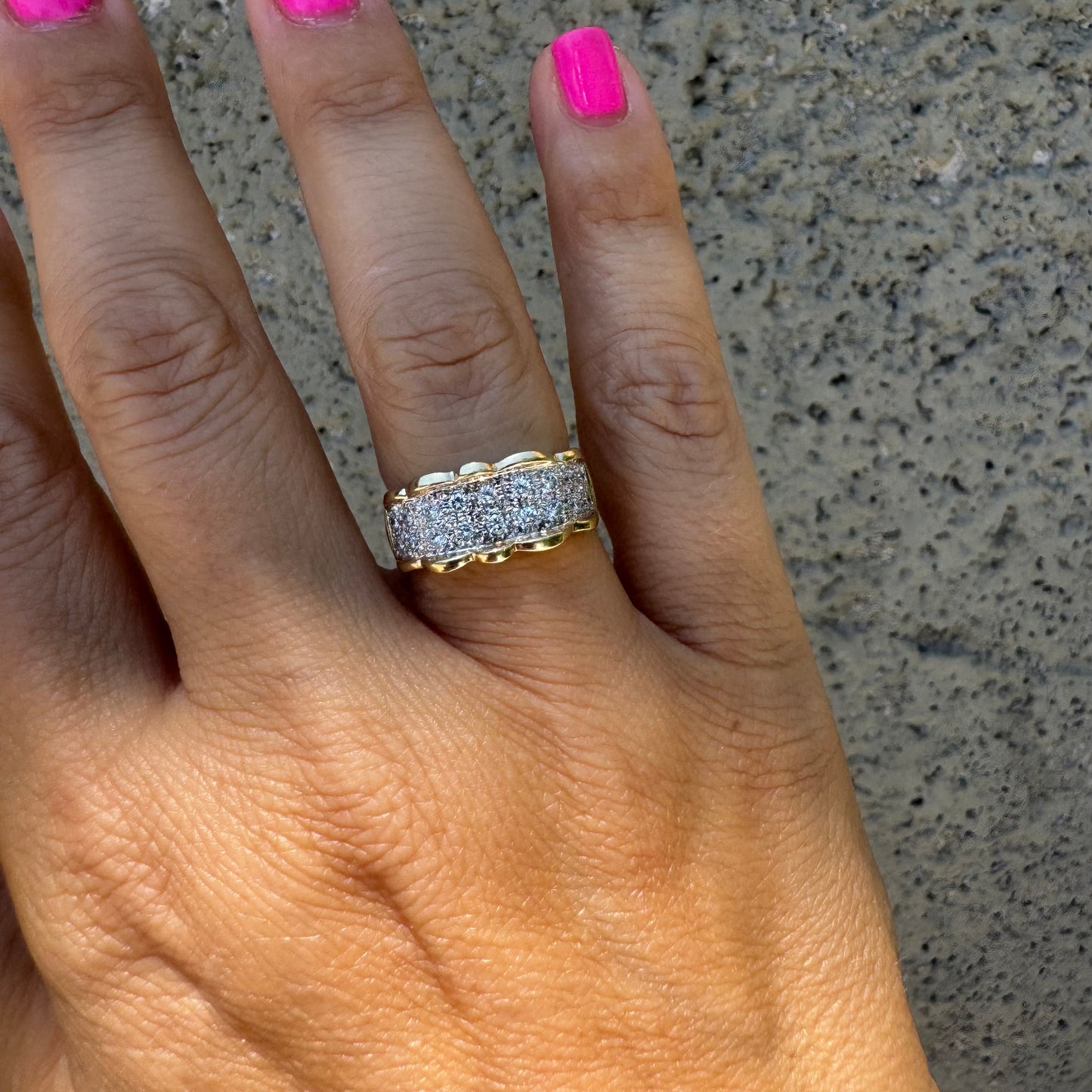 14K gold ring set with center pavé of sparkling Diamonds framed with softly waved gold edges