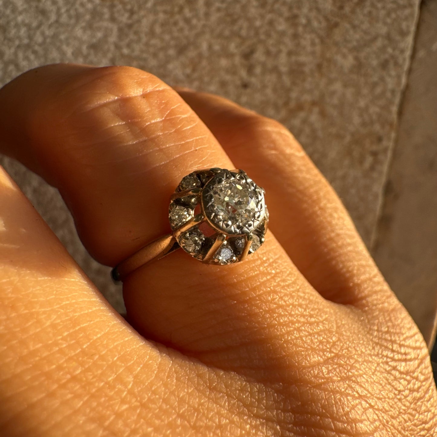 18K gold ring set with Diamonds in     a classic cluster-style