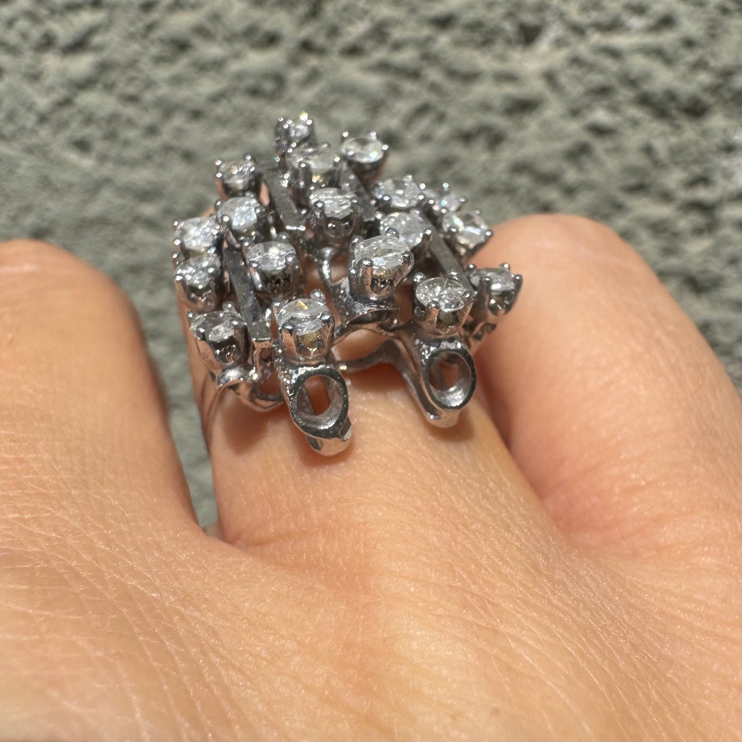 14K gold ring with a geometric design, set with multiple round Diamonds that create a sparkling, structured look.