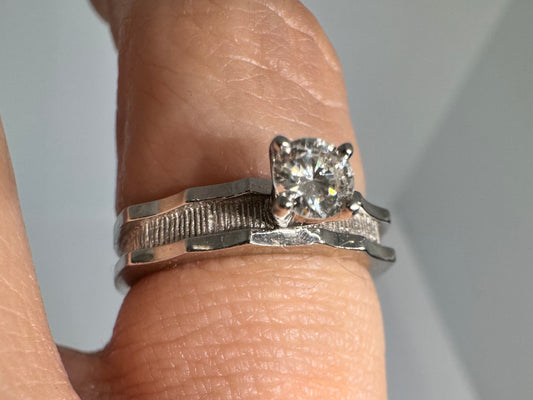 14K gold ring set with one center Diamond