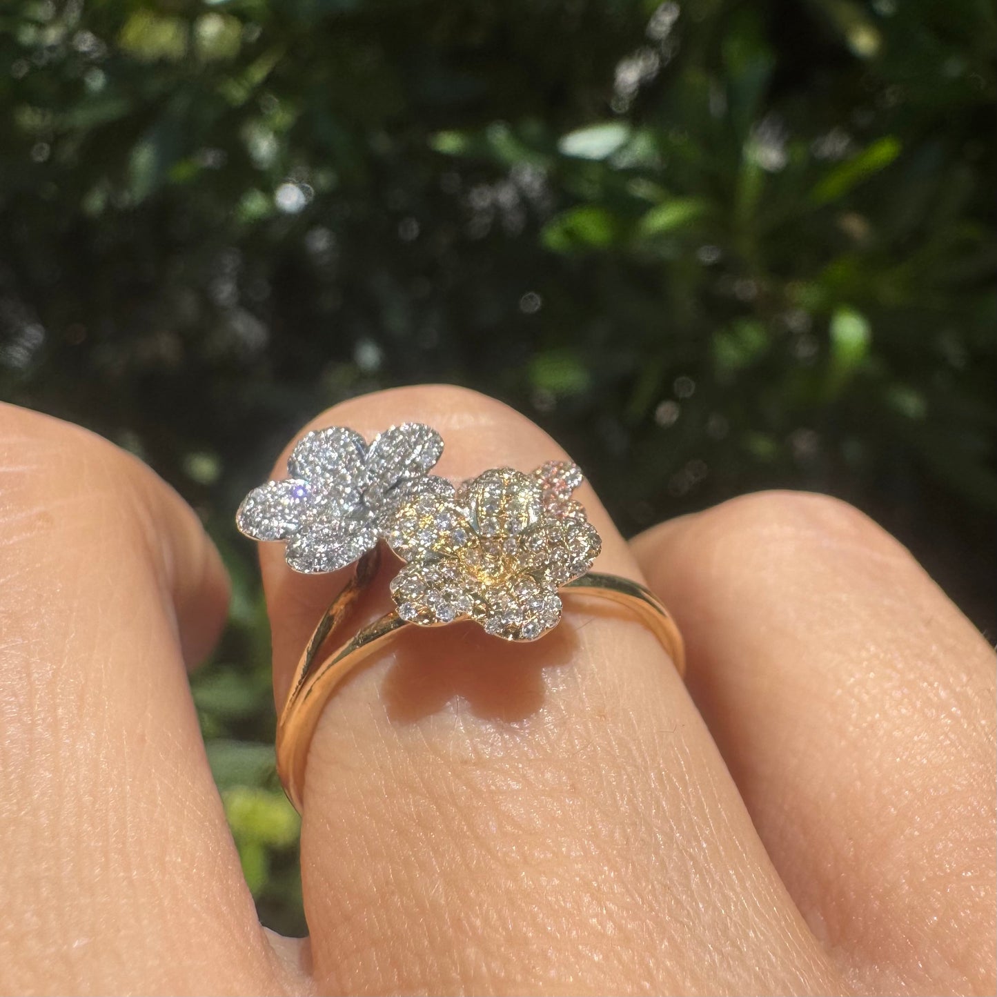 14K gold trio ring featuring white, yellow & rose gold blossoms, each encrusted with sparkling Diamonds.