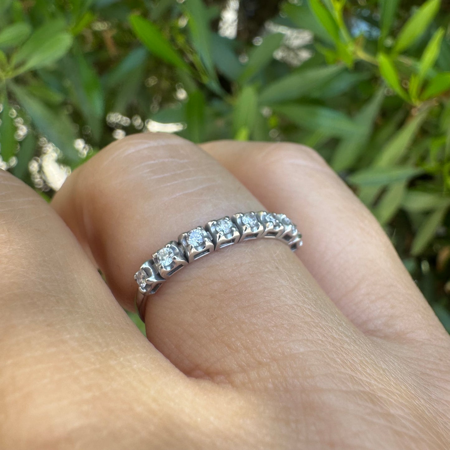 14K gold ring set with a row of sparkling Diamonds