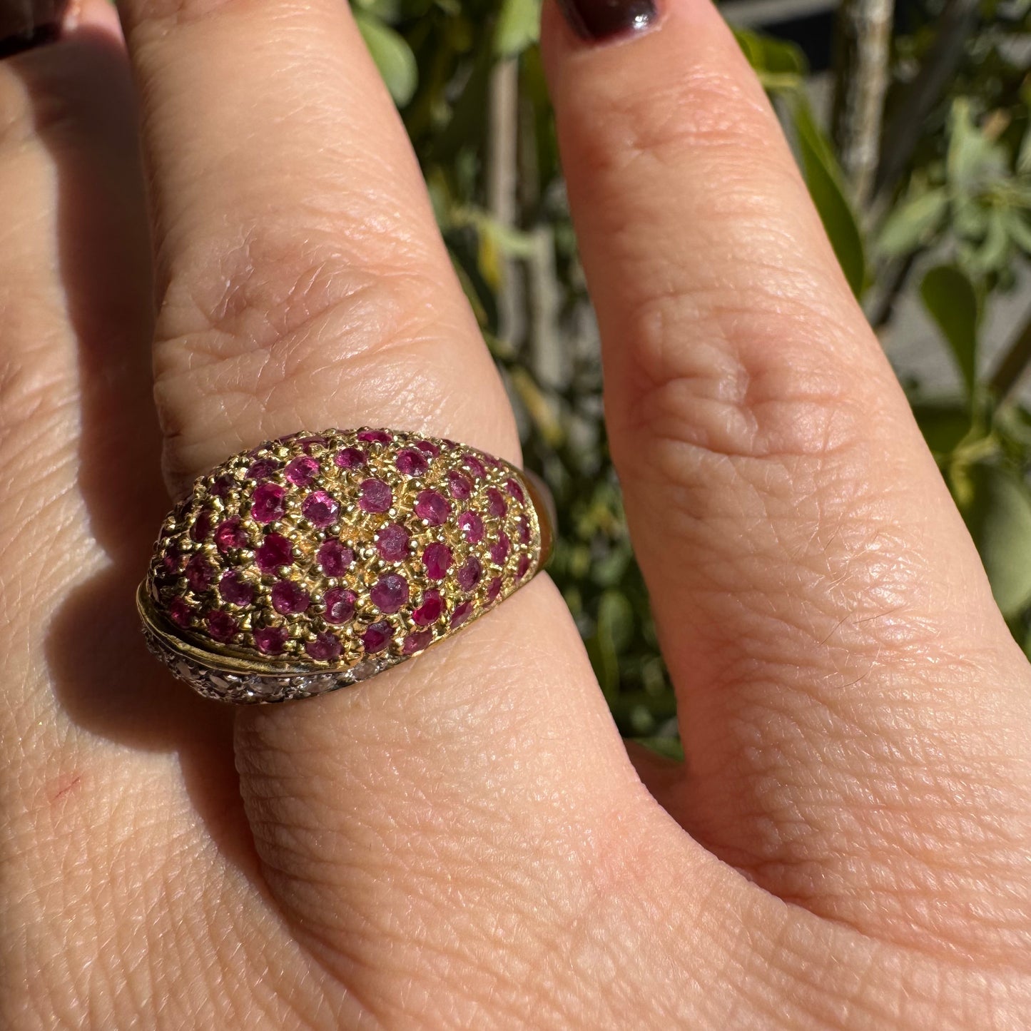 14K gold dome ring pavé-set with Diamonds and vivid Rubies in a striking two-tone design