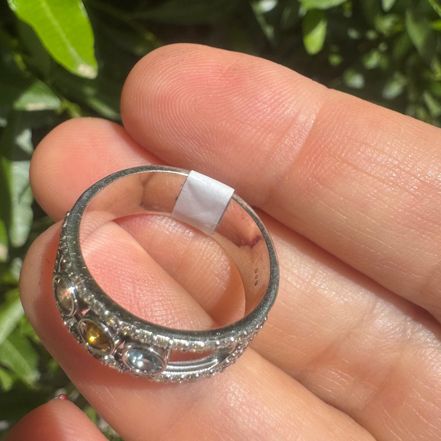 14K gold ring set with Aquamarine, Citrine and Rose Quartz, framed by a pave’ of sparkling diamonds