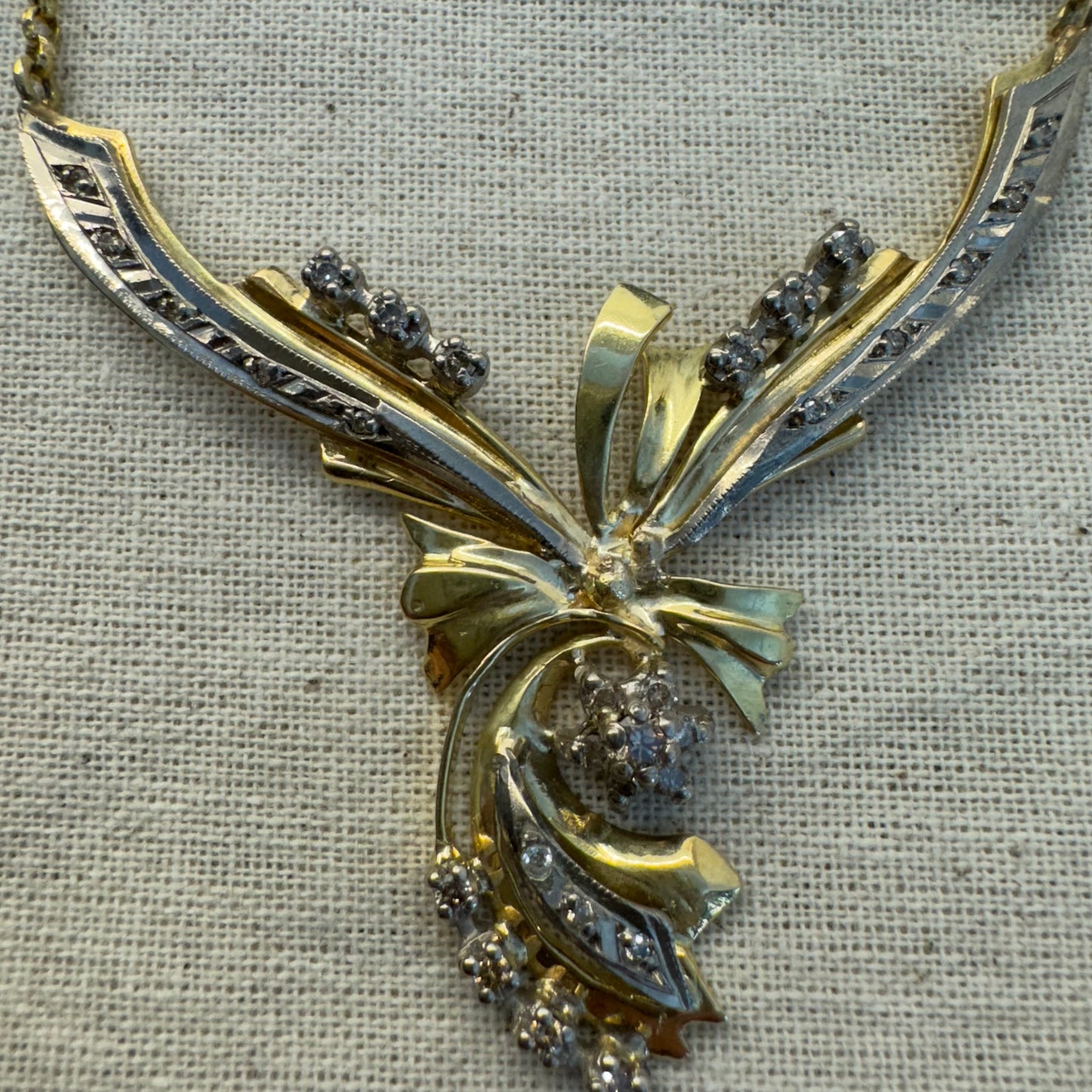 18K two-tone vintage necklace with a unique and elegant design set with Diamonds