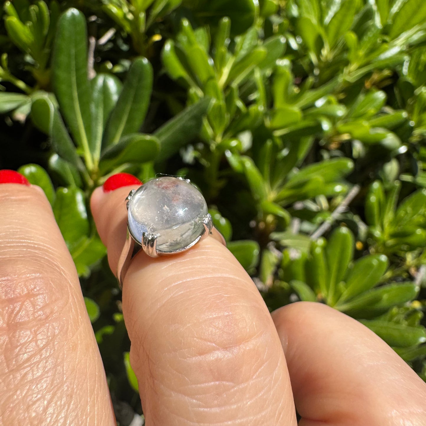 Palladium ring set with a large clear Rock Crystal cabochon.