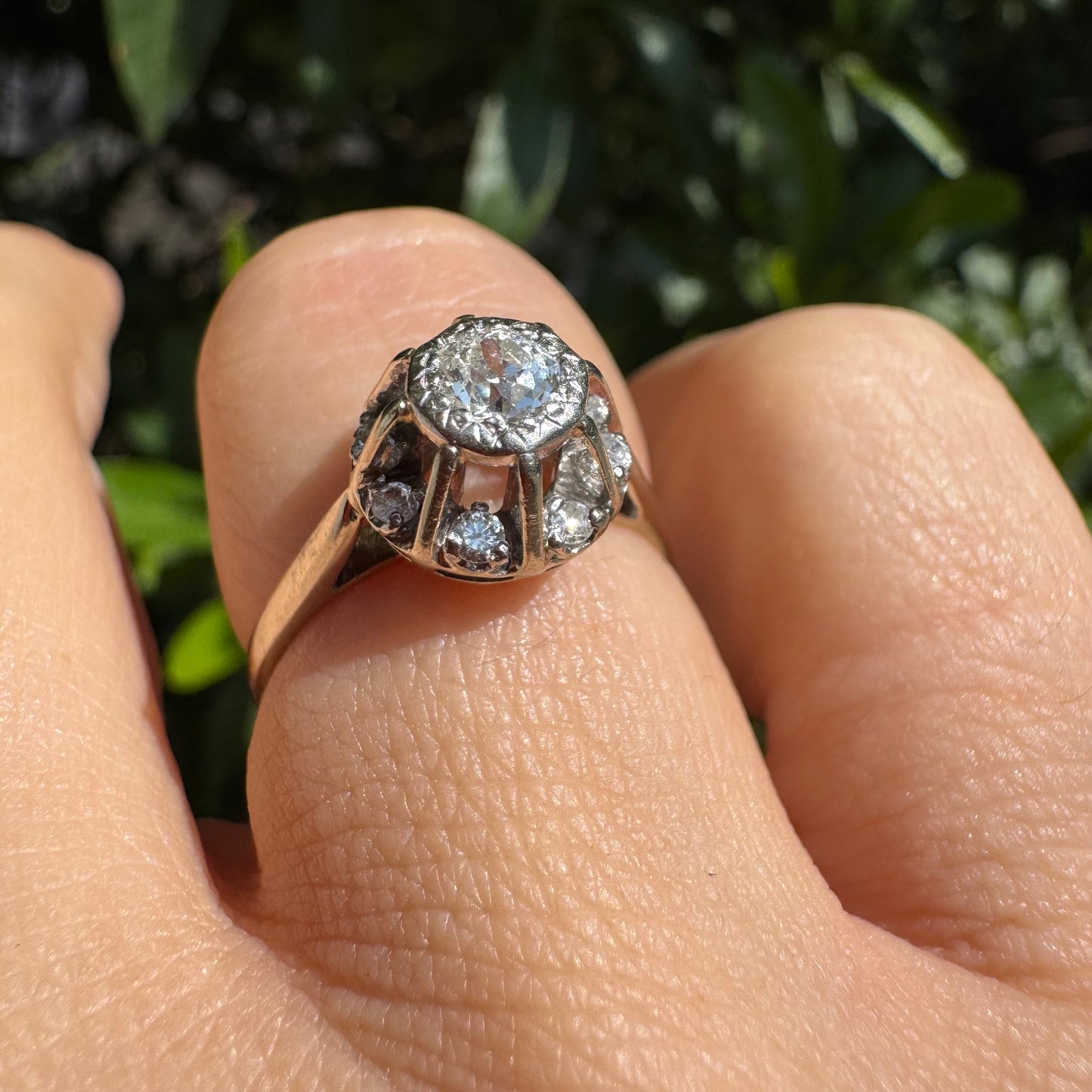 18K gold ring set with Diamonds in     a classic cluster-style