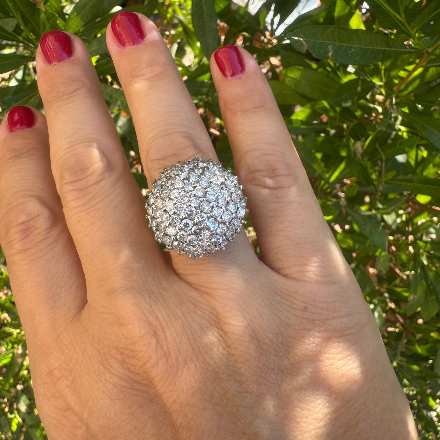 18K gold ring set with Diamonds in a bold pavé setting.