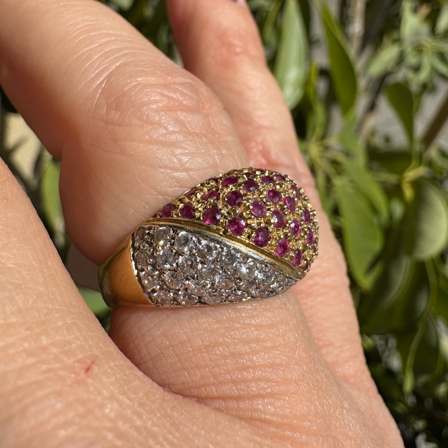 14K gold dome ring pavé-set with Diamonds and vivid Rubies in a striking two-tone design