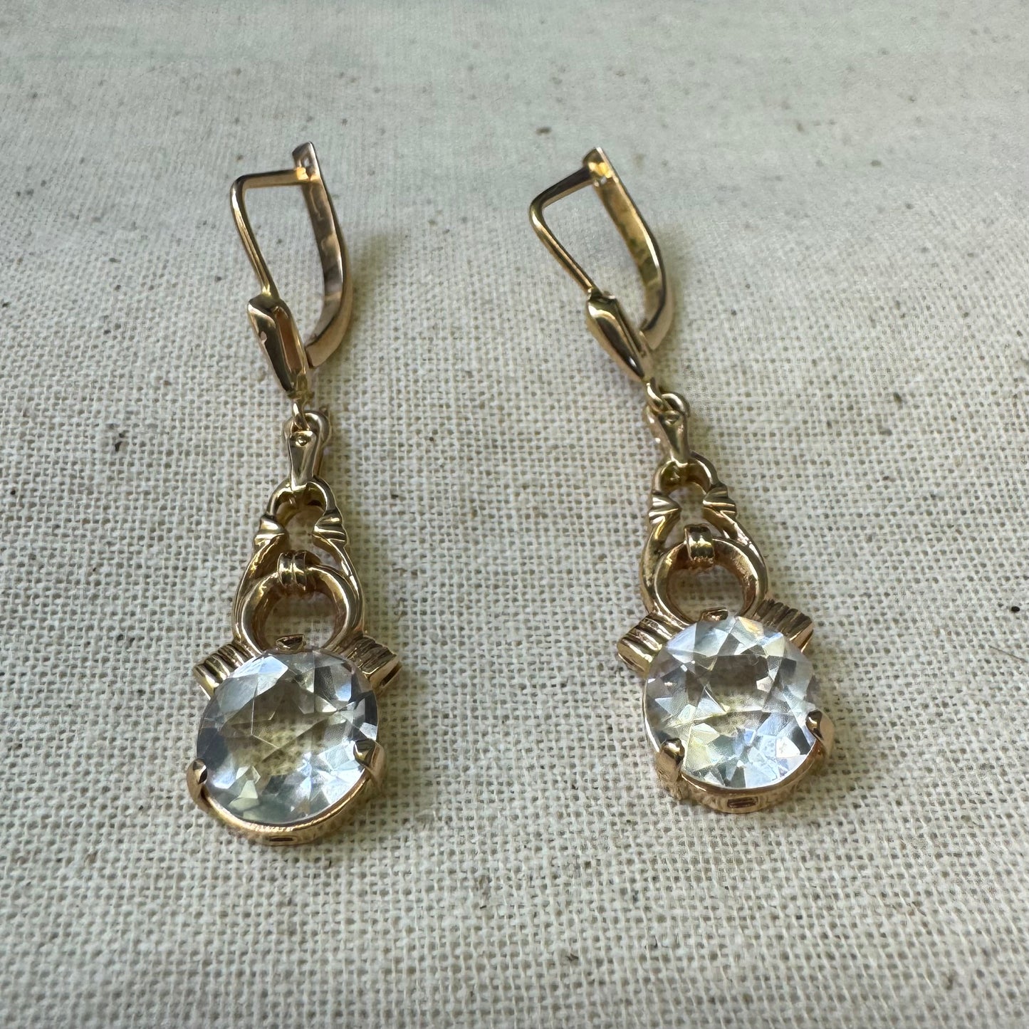 14K gold drop earrings crafted in warm gold, featuring old-cut clear stones