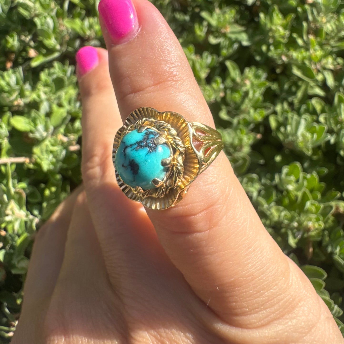 18K gold ring set with a unique Turquoise