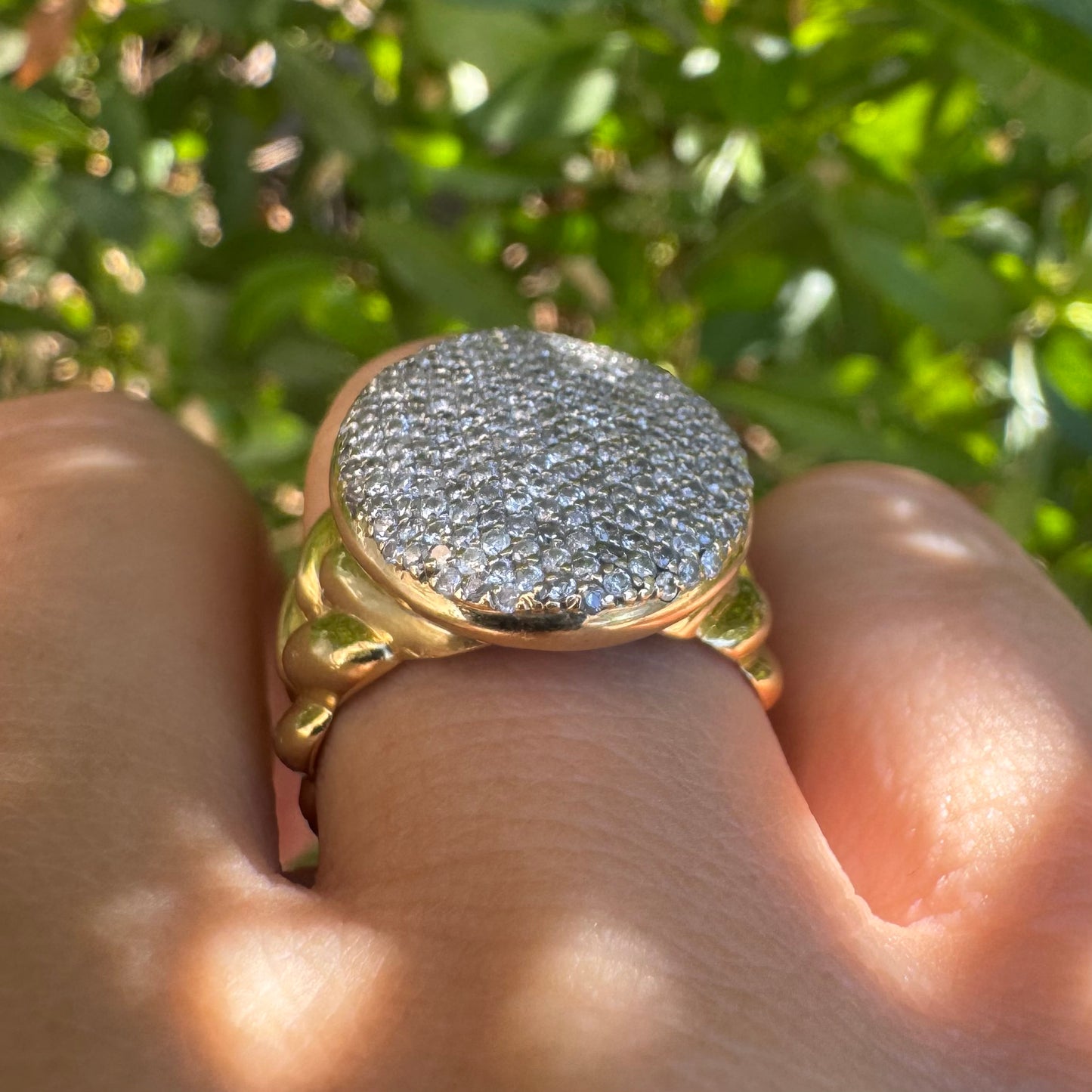 18K gold ring set with a dazzling dome of pavé-set diamonds