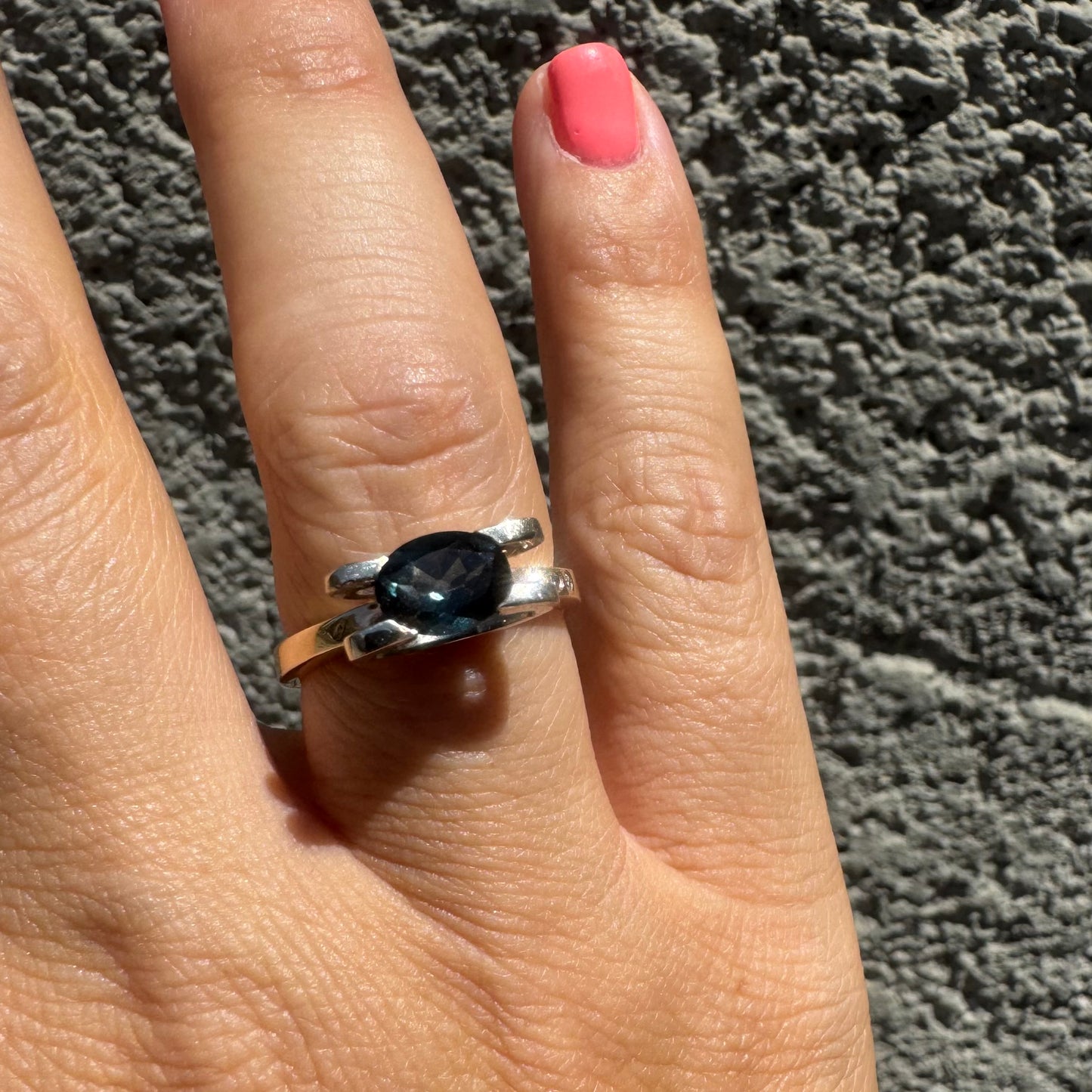 14K gold ring set with an oval-cut Blue Topaz “London”