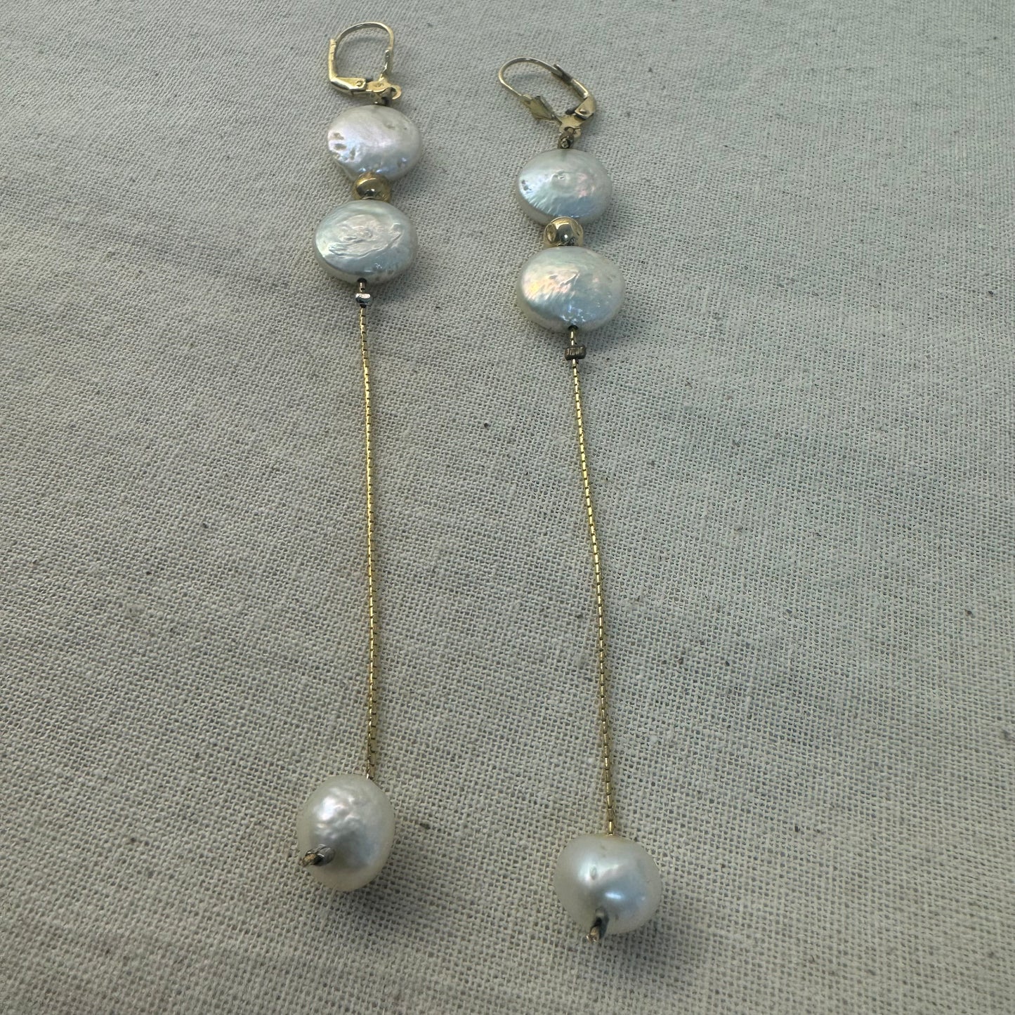 14K gold long drop earrings set lustrous coin pearls and baroque pearl drops