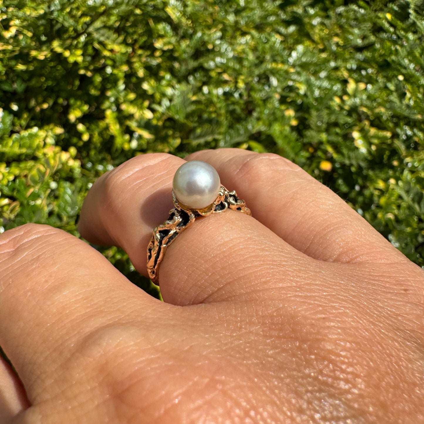 14K gold ring set a luminous white Pearl set on an ornate yellow gold band