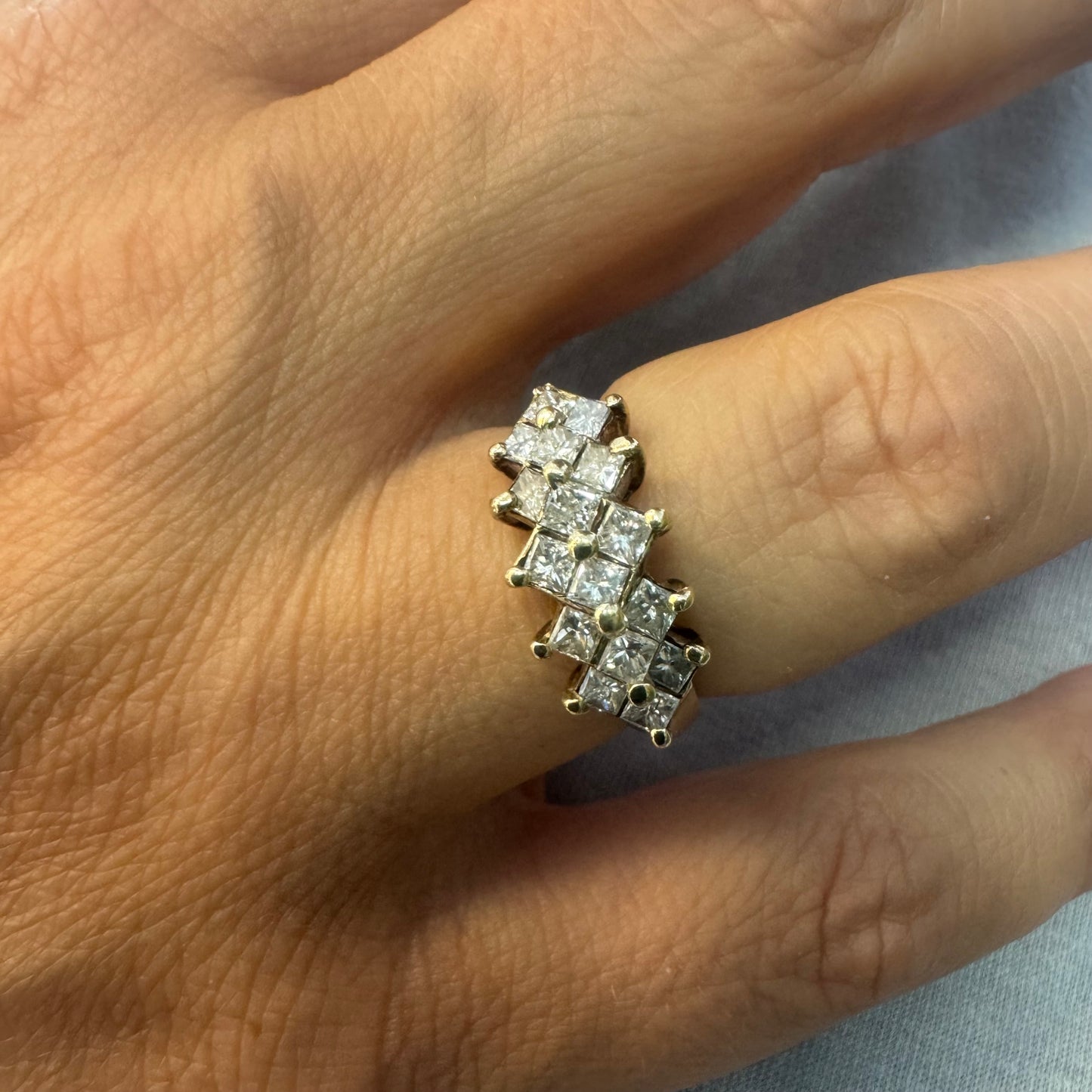 14K gold ring set with Diamonds in a criss-cross design