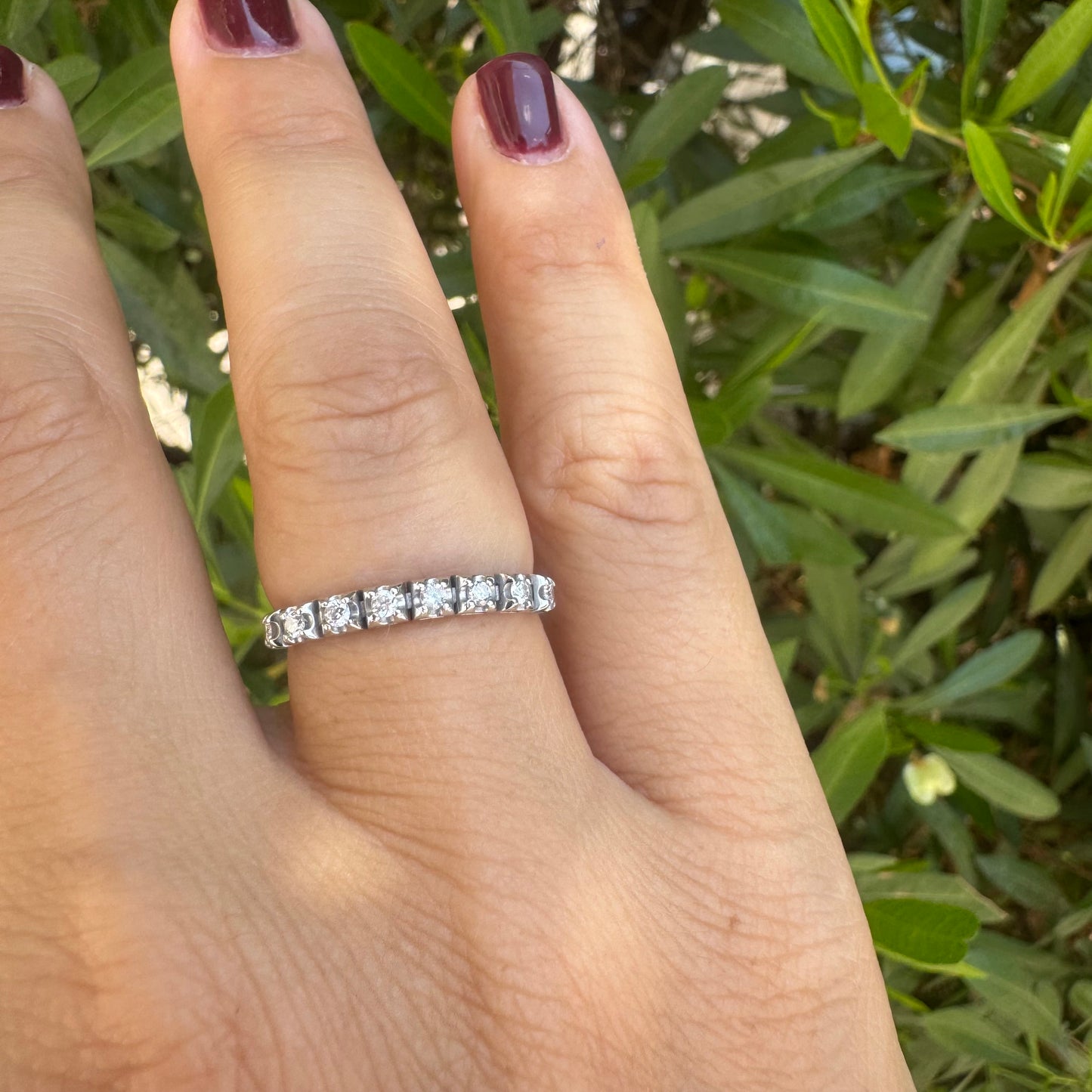 14K gold ring set with a row of sparkling Diamonds