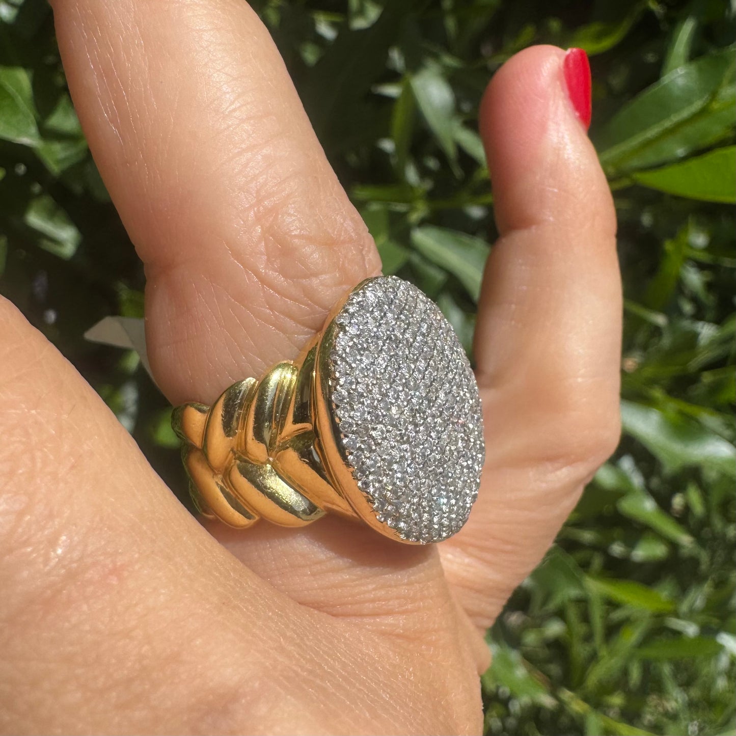 18K gold ring set with a dazzling dome of pavé-set diamonds