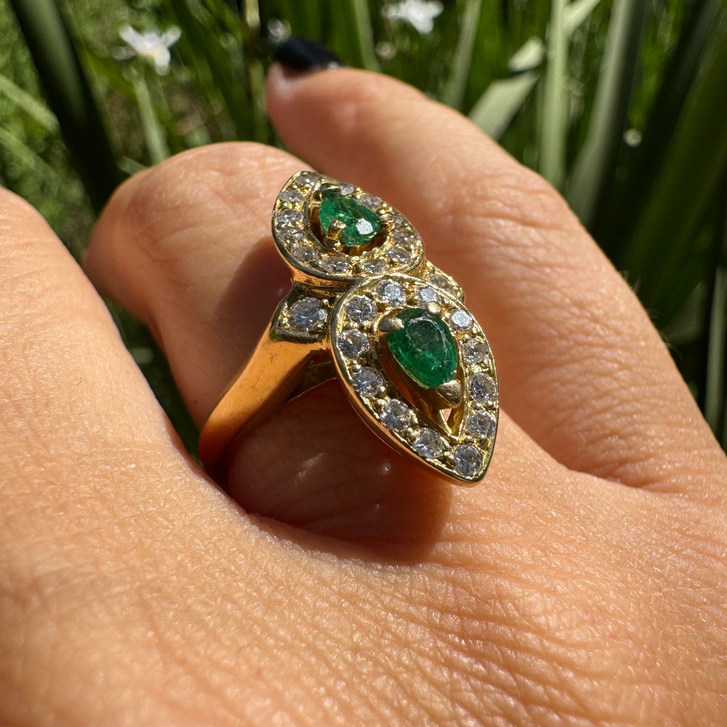 18K gold ring set with two pear-cut Emeralds & Diamonds