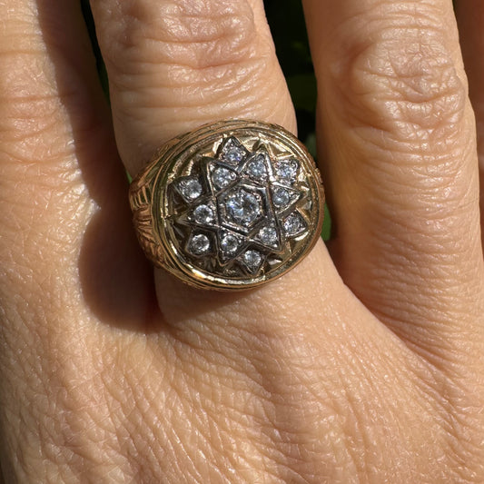 18K gold ring set with a dazzling double Star of David motif, meticulously set with shimmering Diamonds