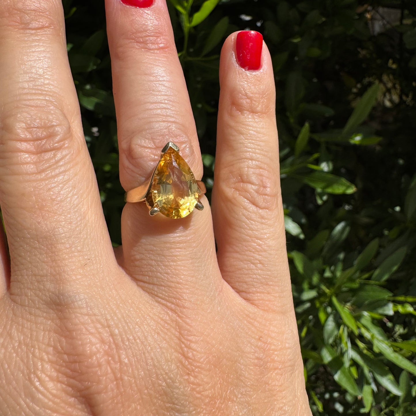14K gold ring set with a large pear-shaped Citrine