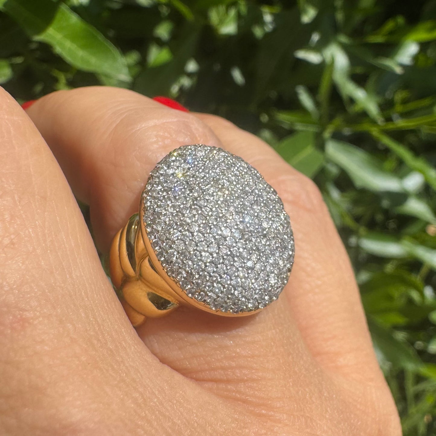 18K gold ring set with a dazzling dome of pavé-set diamonds