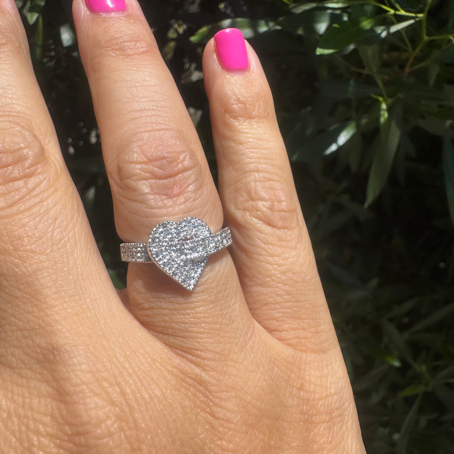 14K gold heart-shaped ring encrusted with shimmering Diamonds