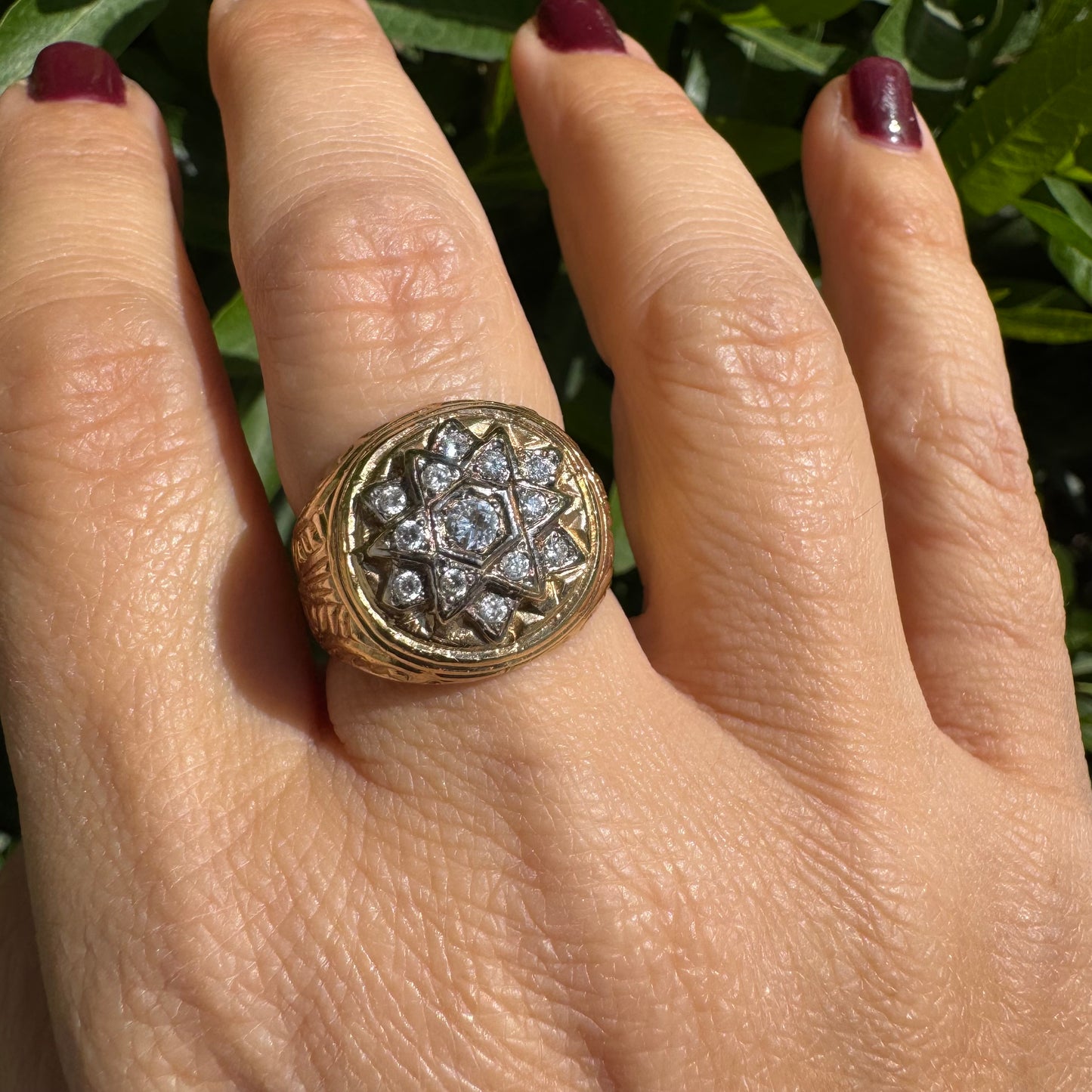 18K gold ring set with a dazzling double Star of David motif, meticulously set with shimmering Diamonds